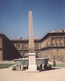 An upclose look at the obelisk and sun dial located in front of the Pitti Palace in the Boboli Gardens