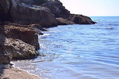The sea crashing against the rocks along the coast of Minturno, Italy.