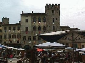 The Palazzo Cofani-Brizzolari and the Torre Faggiolana sit on the southwest side of the piazza Grande in Arezzo.