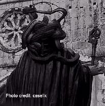Statue of San Domenico covered with snakes