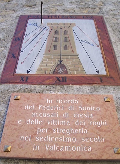 Plaque commemorating the witch trials in Valcamonica